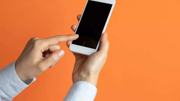 Person holding phone with one hand and using index finger to scroll